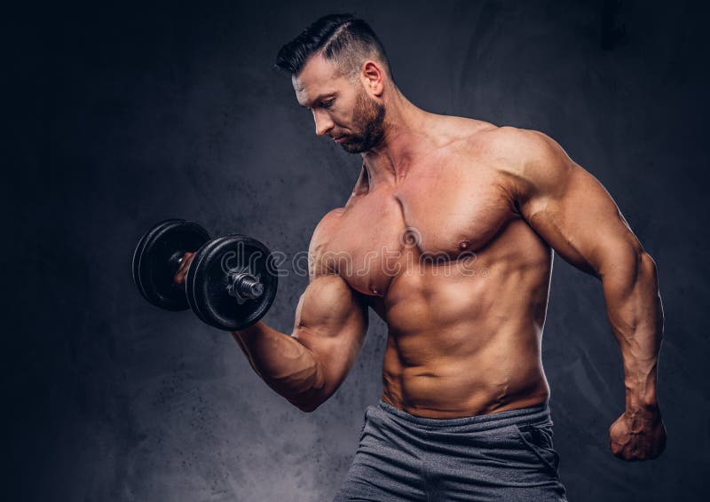 Portrait of a Shirtless Tall Huge Male with a Muscular Body with a Stylish  Haircut and Beard, in a Sports Shorts Stock Photo - Image of horizontal,  muscular: 115244262