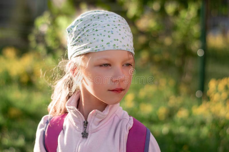 Portrait of a six-year-old girl in a bandana stock photos