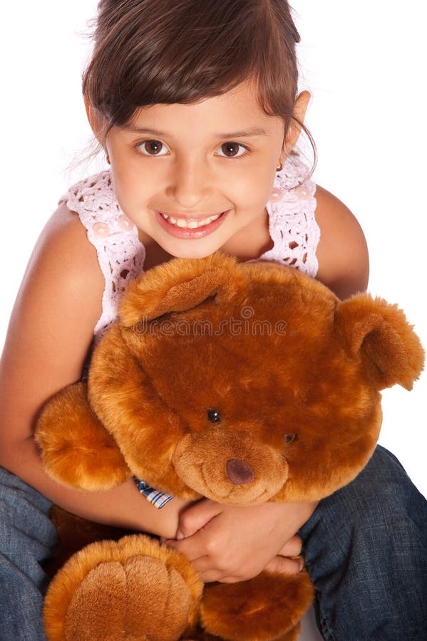 Child with toy bear cub stock image. Image of brown, embraces - 6056477