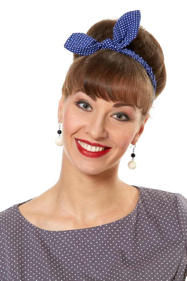 Portrait of a smiling beautiful brunette pin-up woman isolated over white background royalty free stock photography Portrait of a smiling beautiful brunette pin-up woman isolated over white background royalty free stock photography