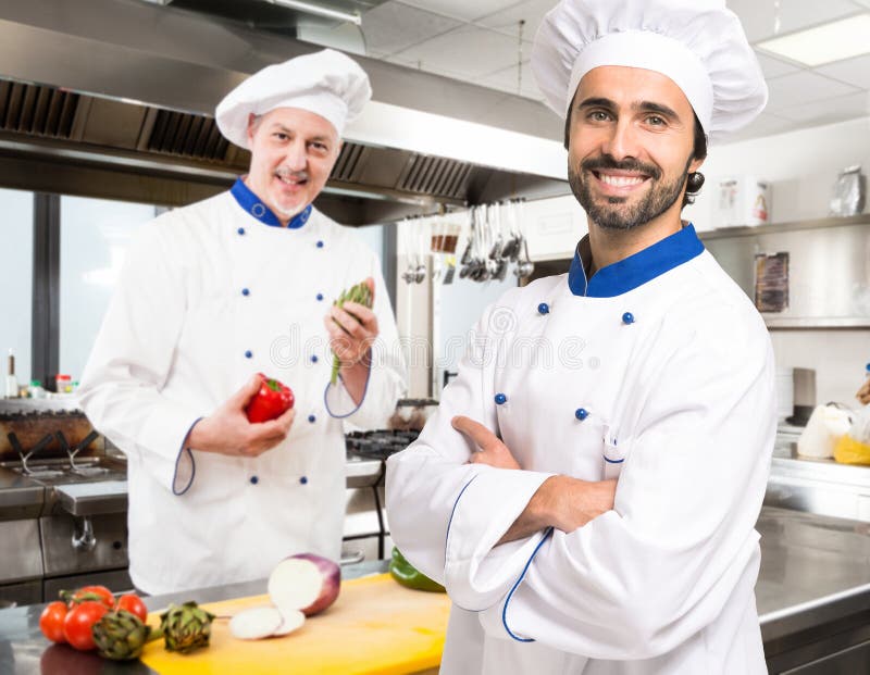 Professional chefs at work stock photo. Image of indoor 38212818