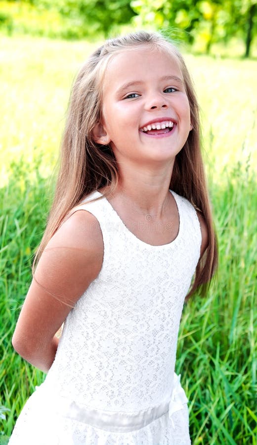 Portrait of Smiling Cute Little Girl in Summer Day Stock Photo - Image ...