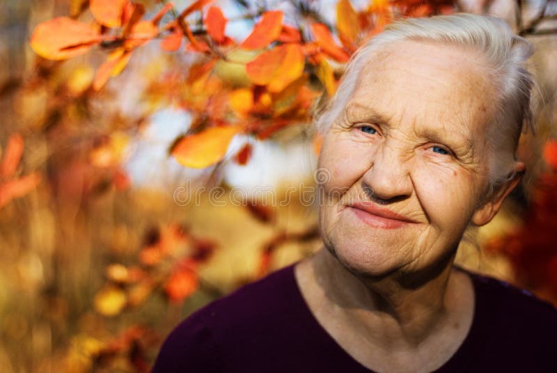 Portrait of the smiling elderly woman