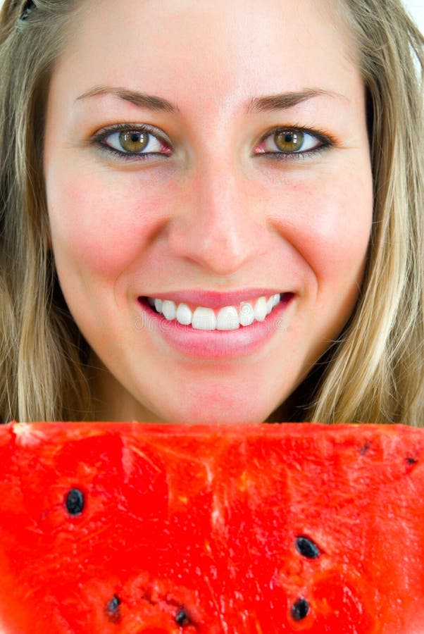 Portrait of a smiling girl with water-melon