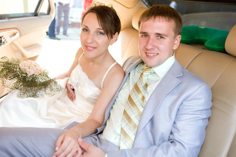 Portrait smiling groom and bride