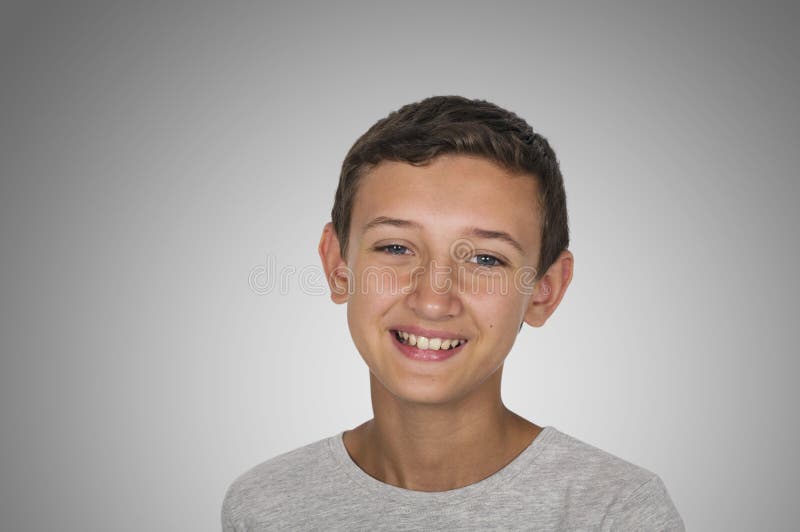 Portrait of a smiling happy teen guy