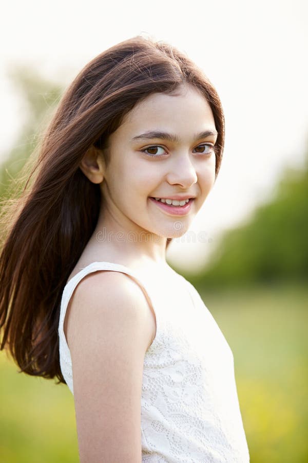 Portrait Of Smiling Hispanic Girl In Countryside stock images Portrait Of Smiling Hispanic Girl In Countryside stock images