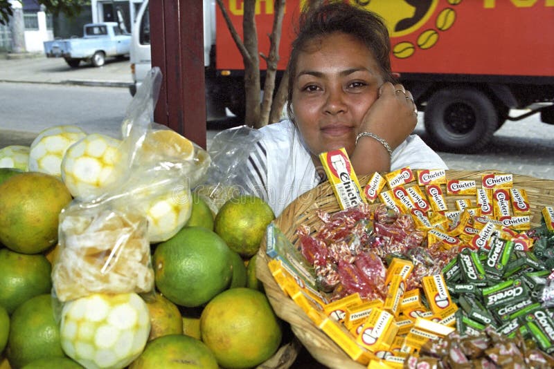 Portrait smiling Latino market vendor, Managua