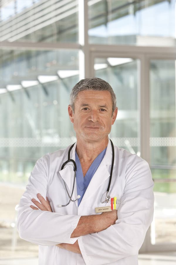 Portrait of smiling male doctor stock photo