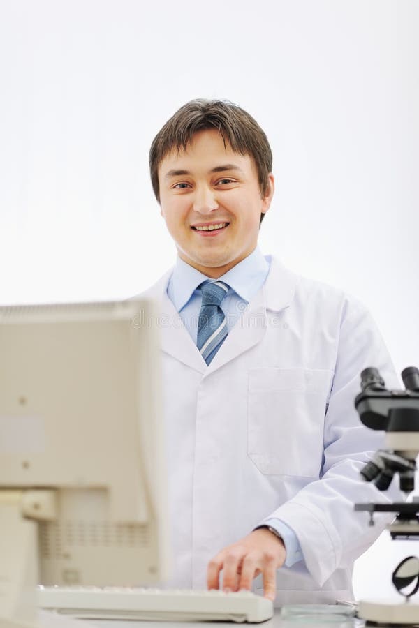 Portrait of smiling medical doctor working in lab royalty free stock photo