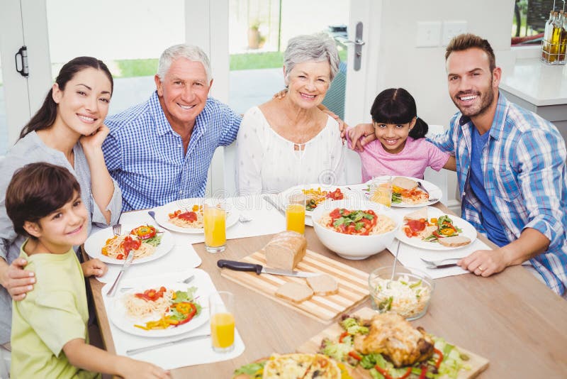 Portrait of Smiling Multi Generation Family with Arm Around Stock Photo ...