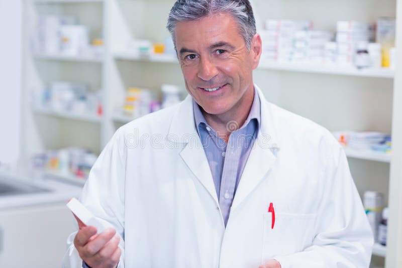 Portrait of a Smiling Pharmacist Wearing Lab Coat Stock Photo Image