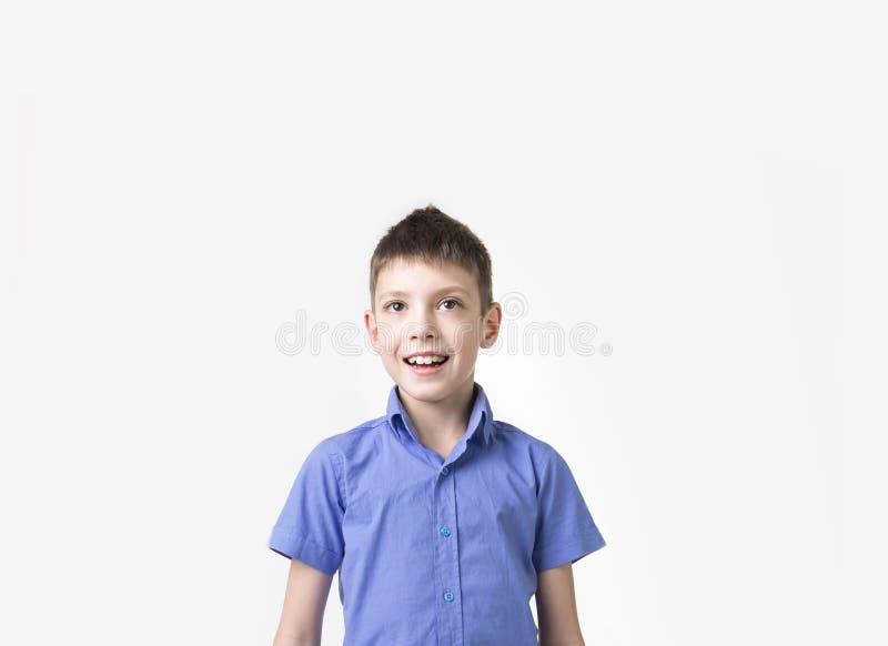 Portrait of smiling teen boy. Happy teenager wearing t-shirt.