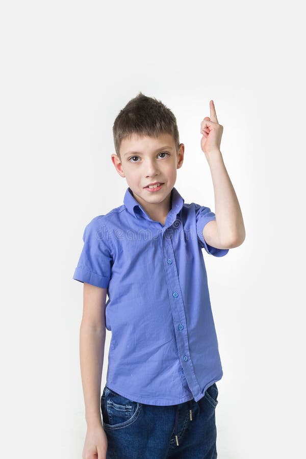 Portrait of smiling teen boy. Happy teenager wearing t-shirt.