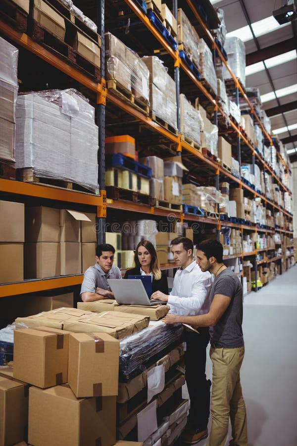 Portrait of smiling warehouse managers royalty free stock image