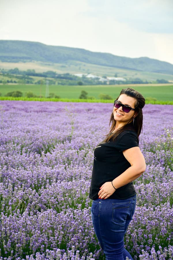 Woman in Lavender field stock photo Woman in Lavender field stock photo