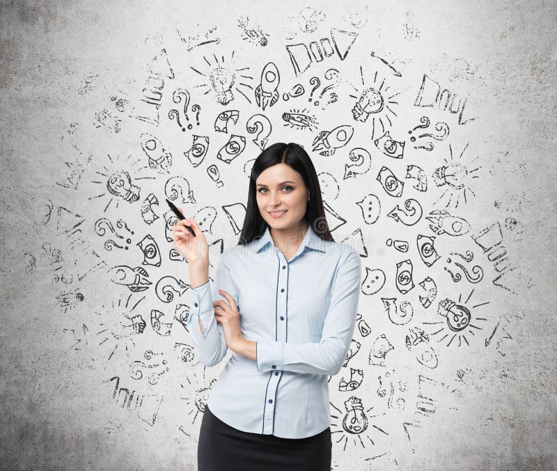 Portrait of smiling woman who points out business icons. stock photos