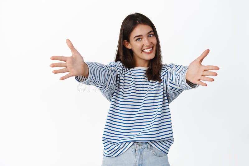 Portrait Of Smiling Young Beautiful Girl Inviting For Hug Reaching