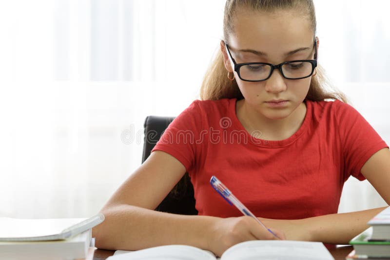 Portrait of a student doing homework royalty free stock photo