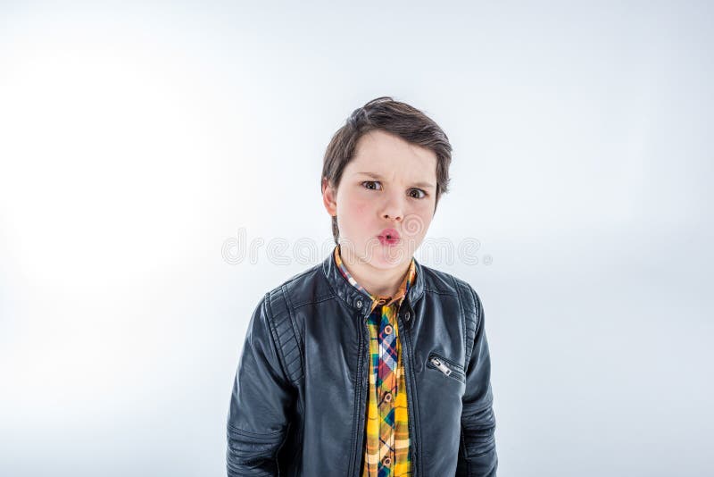 Portrait of stylish grimace boy stock image Portrait of stylish grimace boy stock image