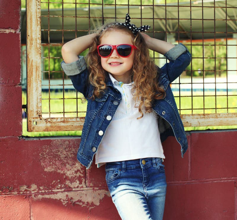 portrait stylish little girl child wearing jeans clothes posing city 217691528