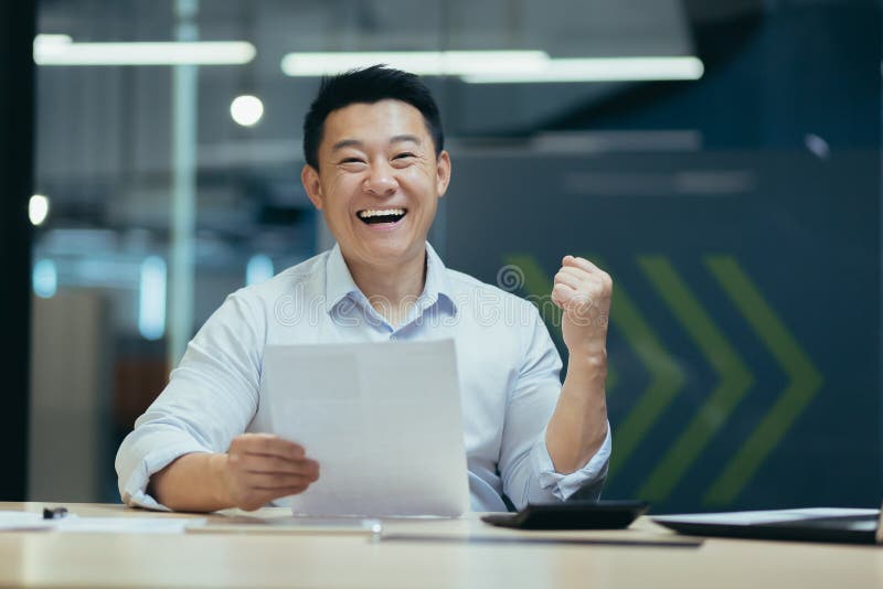 Portrait of successful asian businessman boss, man smiling and looking at camera