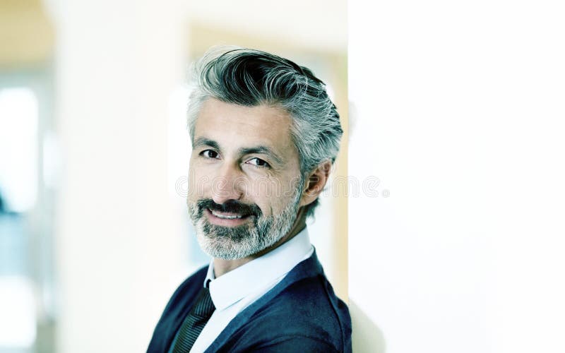 Portrait of successful businessman leaning on wall stock photos Portrait of successful businessman leaning on wall stock photos