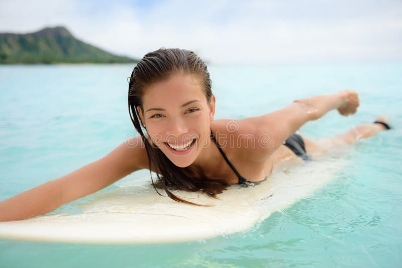 Portrait of surfer surfing fun Waikiki Beach