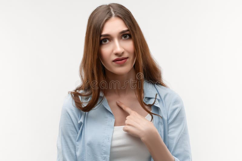 Portrait Of Surprised Brunette Girl Pointing Finger At Herself Face Expression Negative