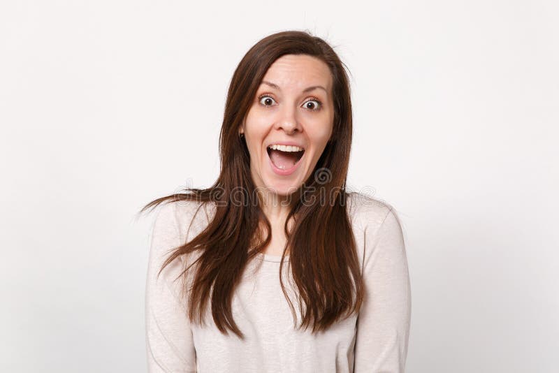 Portrait Of Surprised Excited Beautiful Young Woman In Light Clothes ...
