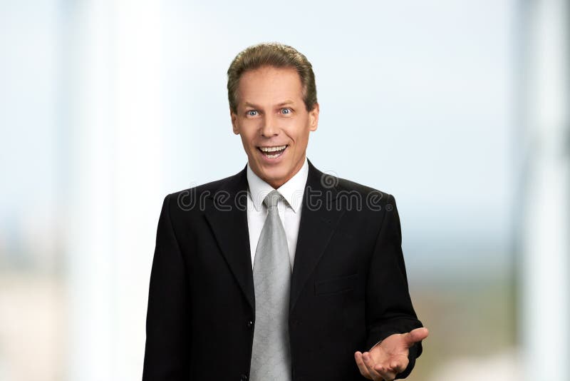 Portrait of surprised excited businessman.