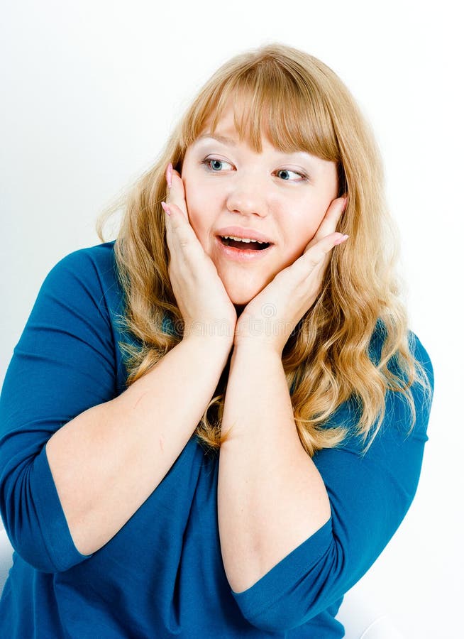 Portrait of a surprised young blonde woman