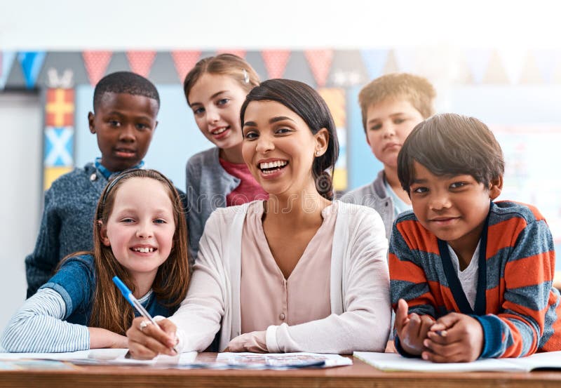 Portrait, teacher and group of kids in classroom for help in growth, child development and lesson for education royalty free stock images