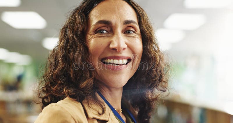 Portrait, teacher and woman with smile, confident and curriculum for knowledge in elementary and education. School royalty free stock image