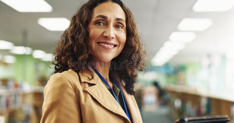 Portrait, teacher and woman with tablet, school and confident for curriculum in elementary and education. Happy stock photos
