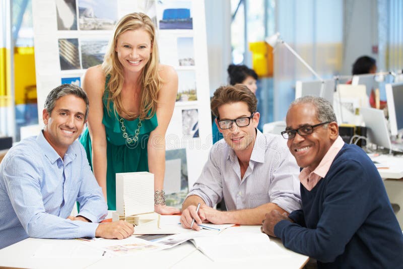 Portrait Of Team In Creative Office Smiling