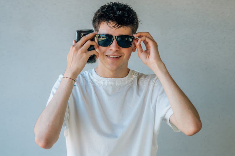 Teen boy with sunglasses stock image. Image of outdoor - 226598485