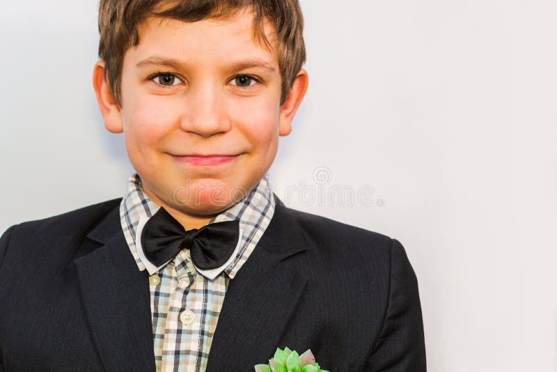 Portrait of a Teenage Boy in a Suit with a Plant in His Pocket Stock ...