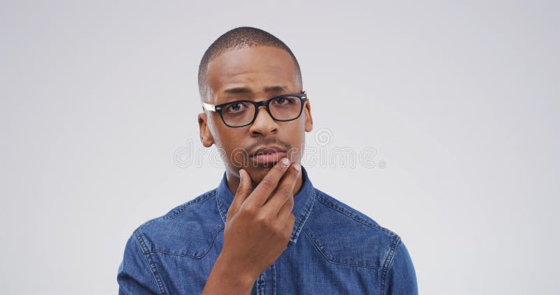 Portrait, thinking and black man with question in studio for why, suspicious and solution to doubt. Mockup space, person royalty free stock images