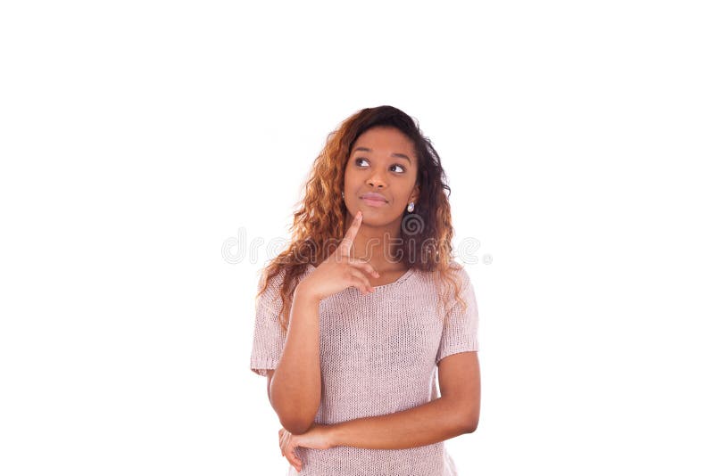 Portrait of a thoughtful young african american woman looking up isolated on white background