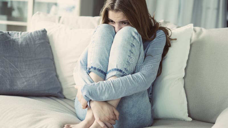 Portrait of thoughtful young woman royalty free stock images
