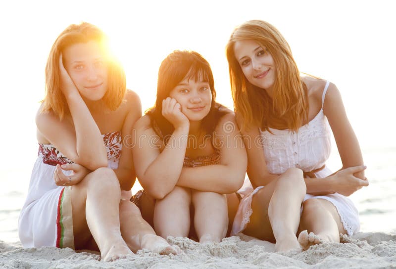 Portrait of three beautiful girls at the beach.