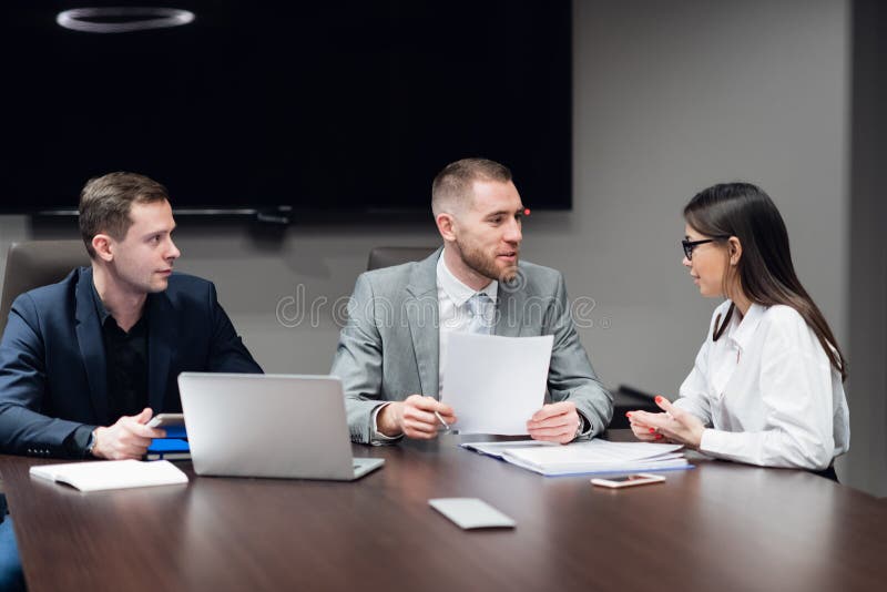 Portrait of Three Coworkers Discussing Business Plan in Office Stock Image Image of