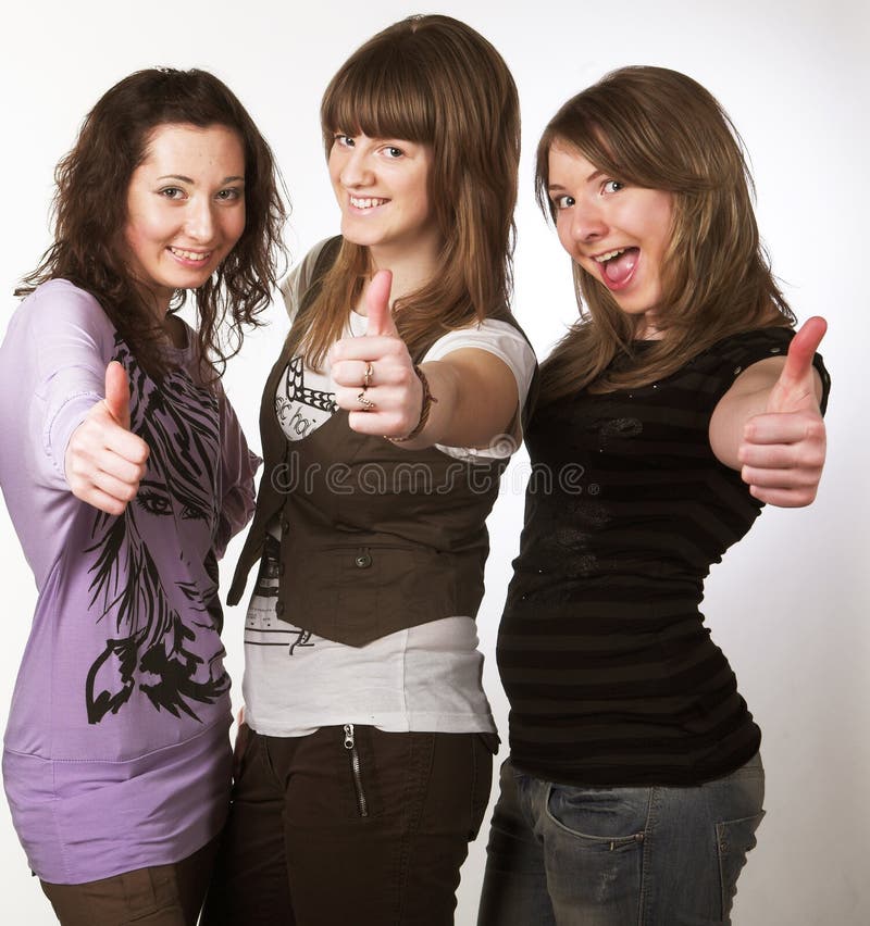 Portrait of three smiling girlfriends