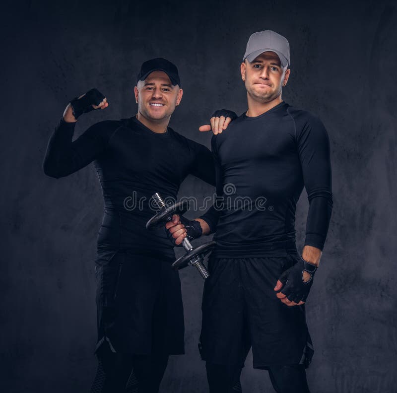 Portrait of two handsome young male dressed in a black sportswea royalty free stock images Portrait of two handsome young male dressed in a black sportswea royalty free stock images