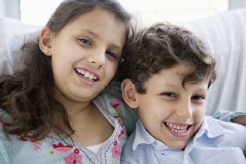 Portrait of two Middle Eastern children at home royalty free stock images