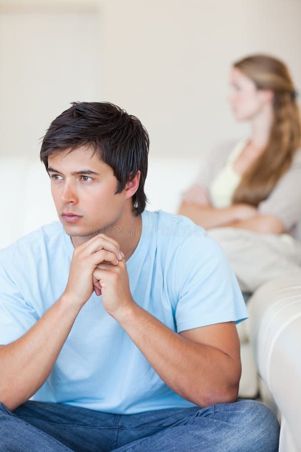 Portrait of an upset couple after an argument in their living room