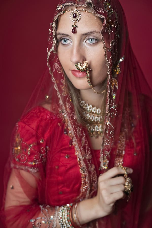 Magnificent Young Indian Bride in Luxurious Bridal Costume with