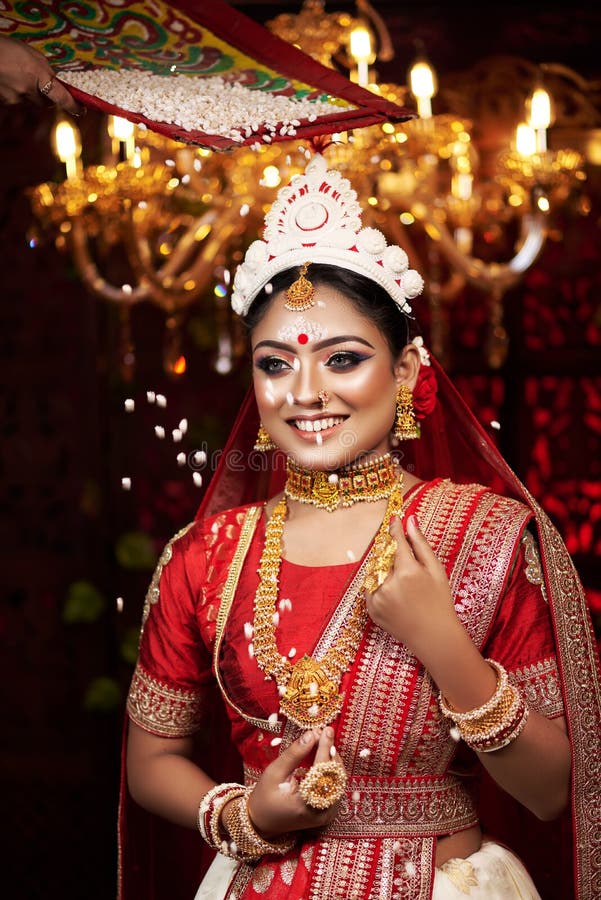 Portrait of Very Beautiful Young Indian Bride in Luxurious Bridal