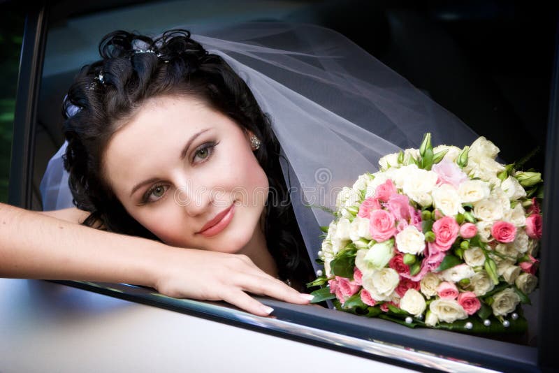 Portrait in the wedding car